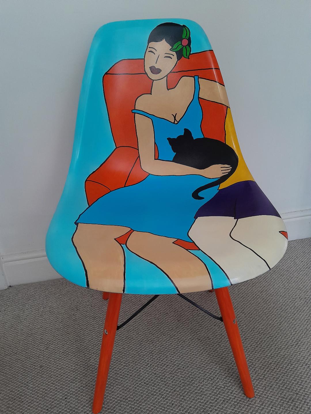 Woman with black cat. Acrylic paint on plastic chair.