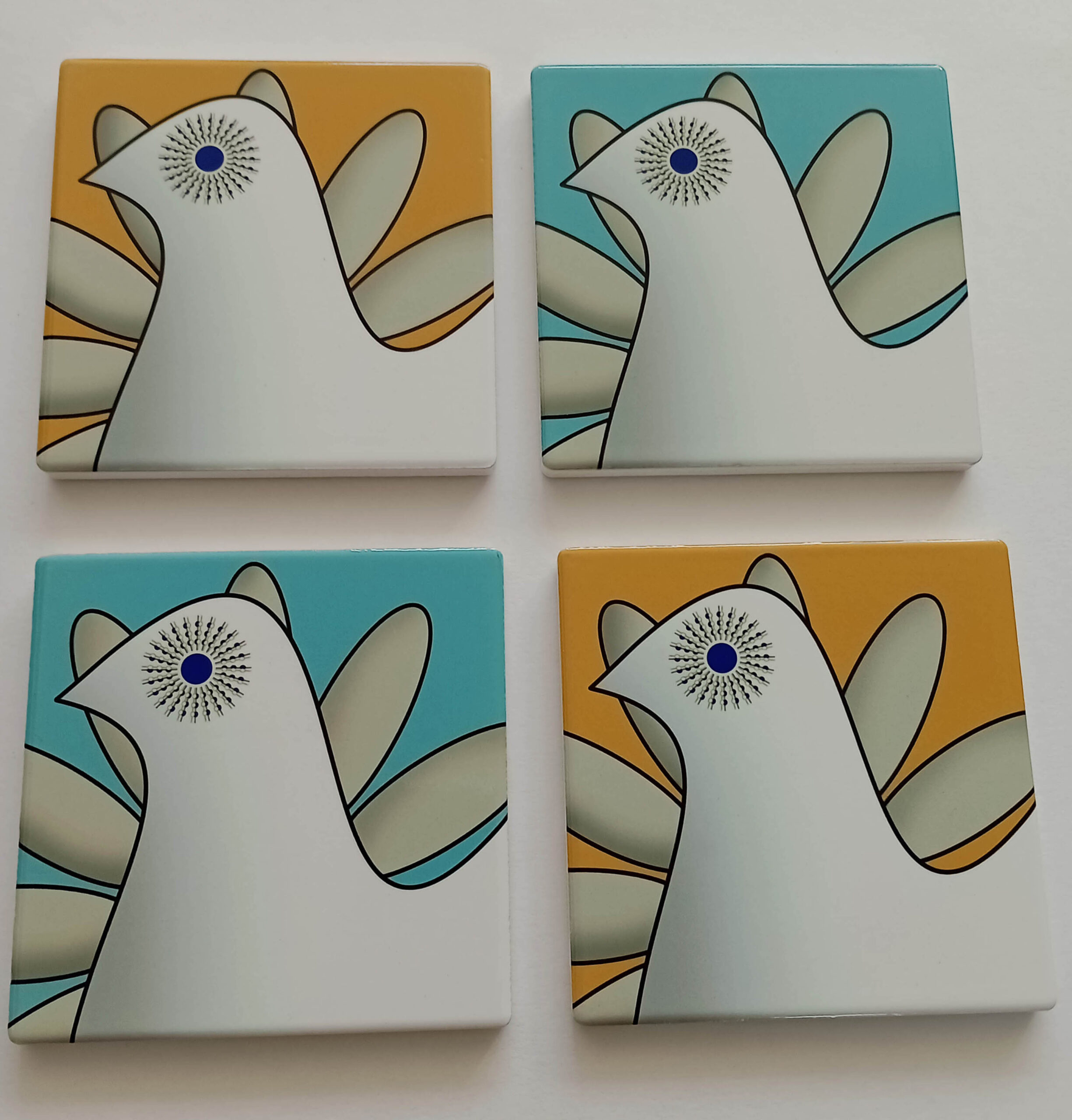 Retro Bird Ceramic Coasters, Set of 4 patterned ceramic coasters, Each tile is approx 10 cm square and neatly backed with 1mm cork backing.